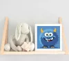 Mosolygós kék szörnyecske - gyerek számfestő készlet - Számfestő.hu - 20×20cm - Keret nélkül